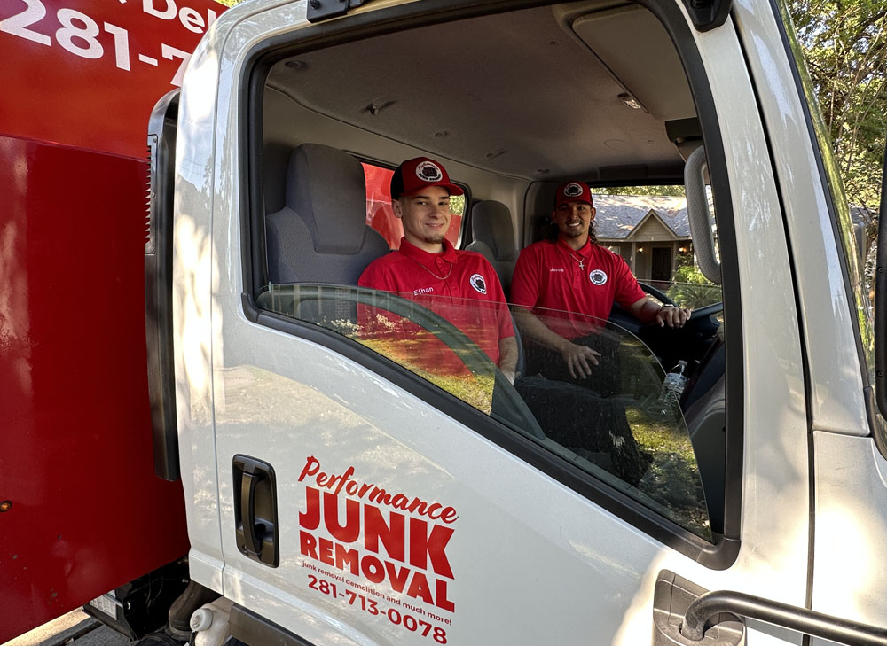 Performance Junk Removal professionals in the truck ready to provide construction debris removal services